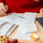 woman-sitting-table-checking-her-bills-after-buying-everything-christmas-winter-holidays-shopping-expensive-time-year-1200×550